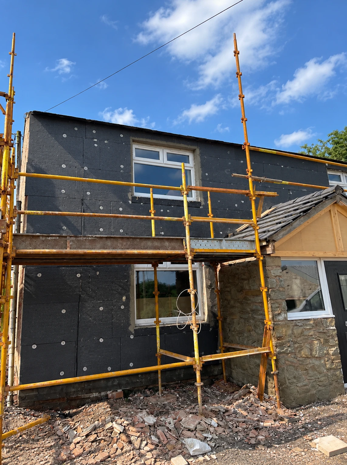 Insulation boards fixed across the front elevation